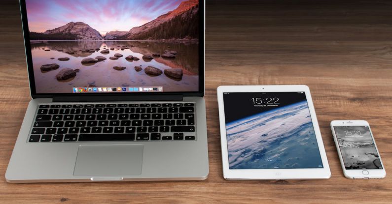 Mobile Marketing - Macbook Pro Beside White Ipad