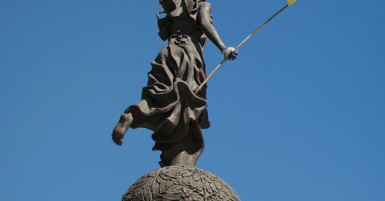 Angel Investing - Ukrainian flag in hand of Nika in Kharkiv